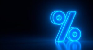 A neon sign of the symbol for percent.