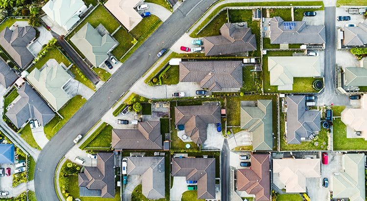 A bird 's eye view of houses and streets.
