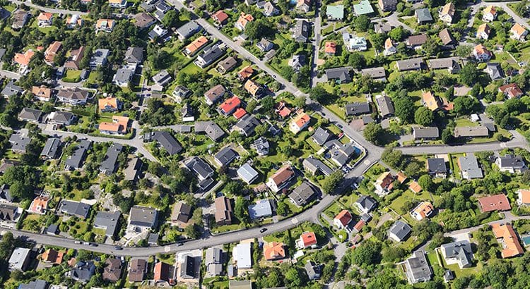A bird 's eye view of many houses and streets.