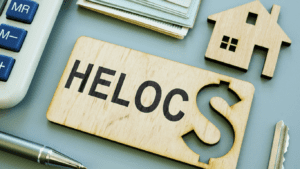 A wooden sign with the word heloc on it.