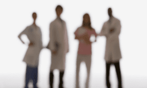 A group of doctors standing in front of each other.