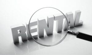 A magnifying glass over the word " rental ".