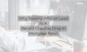 A person sitting at a desk with a computer.