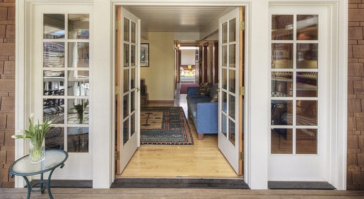 A view of an open door from the living room.