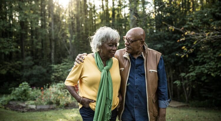 A man and woman standing next to each other.