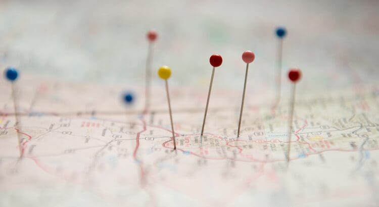 A close up of pins on the map