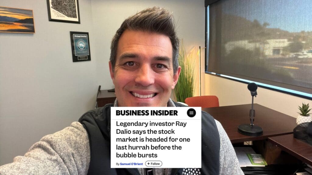 Man smiling in an office setting.