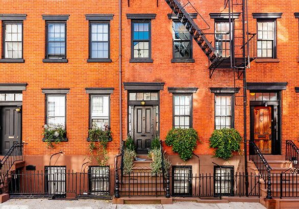 Brownstone townhouses facade in New York City, USA