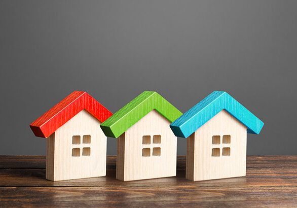 Multi-colored wooden houses. Affordable comfortable housing. Purchase of apartments and real estate, rent and sale. Mortgage. Design and renovation, choose a house to your liking. Roof structures.