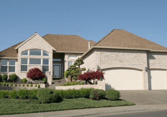 Modern suburban house with landscaped garden.