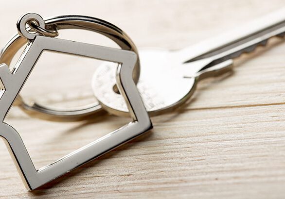 A close up of a key chain with two keys