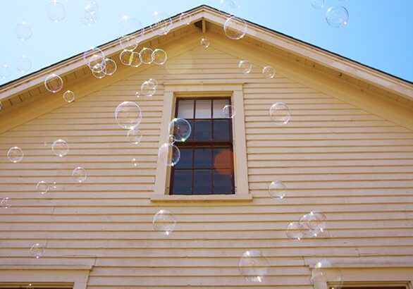 A house with bubbles coming out of the window.